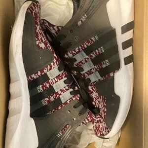 Adidas Black and White Sneakers with Red Pattern